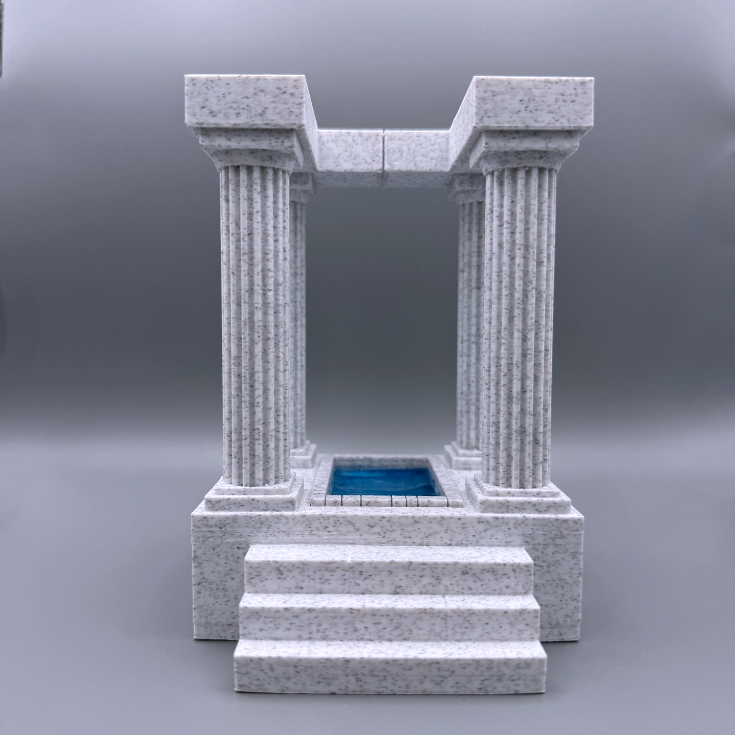 These 3d printed marble bookends are in the form of an ancient temple, with a pool at the center. These stately bookends elevate any bookshelf and add a classical flair. For lovers of antient architecture of Grece and Rome