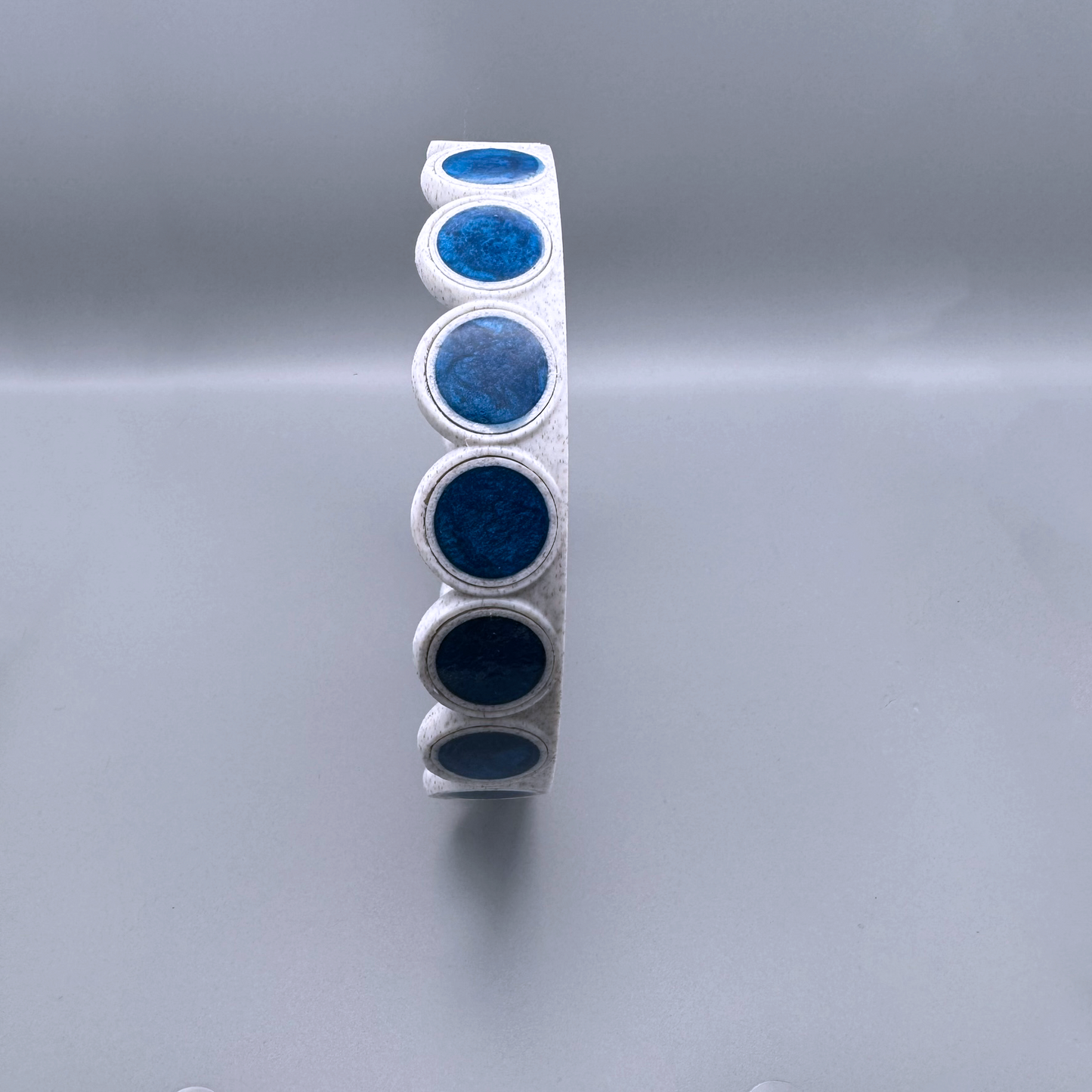 Round 5in white Drip Tray with Repeating Blue Circular Disc Design, planter drip tray, water catcher, water dish