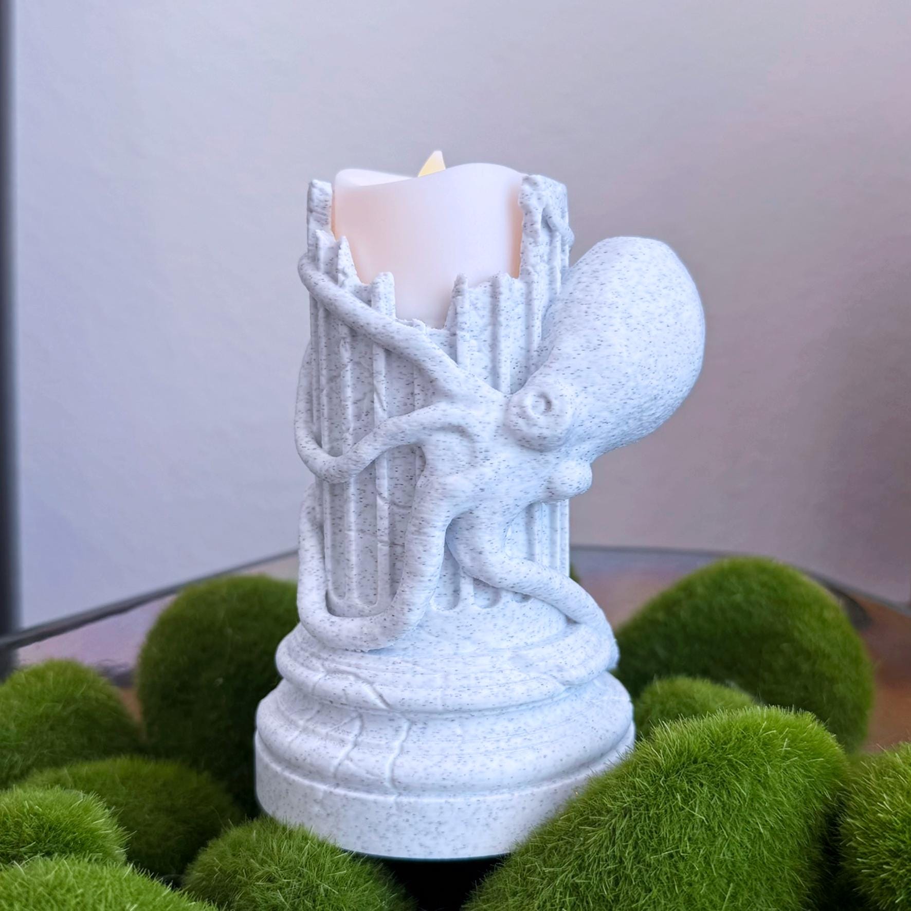 Flameless Sculptural Candle Holder of a Greek Column with an Octopus wrapped around it.