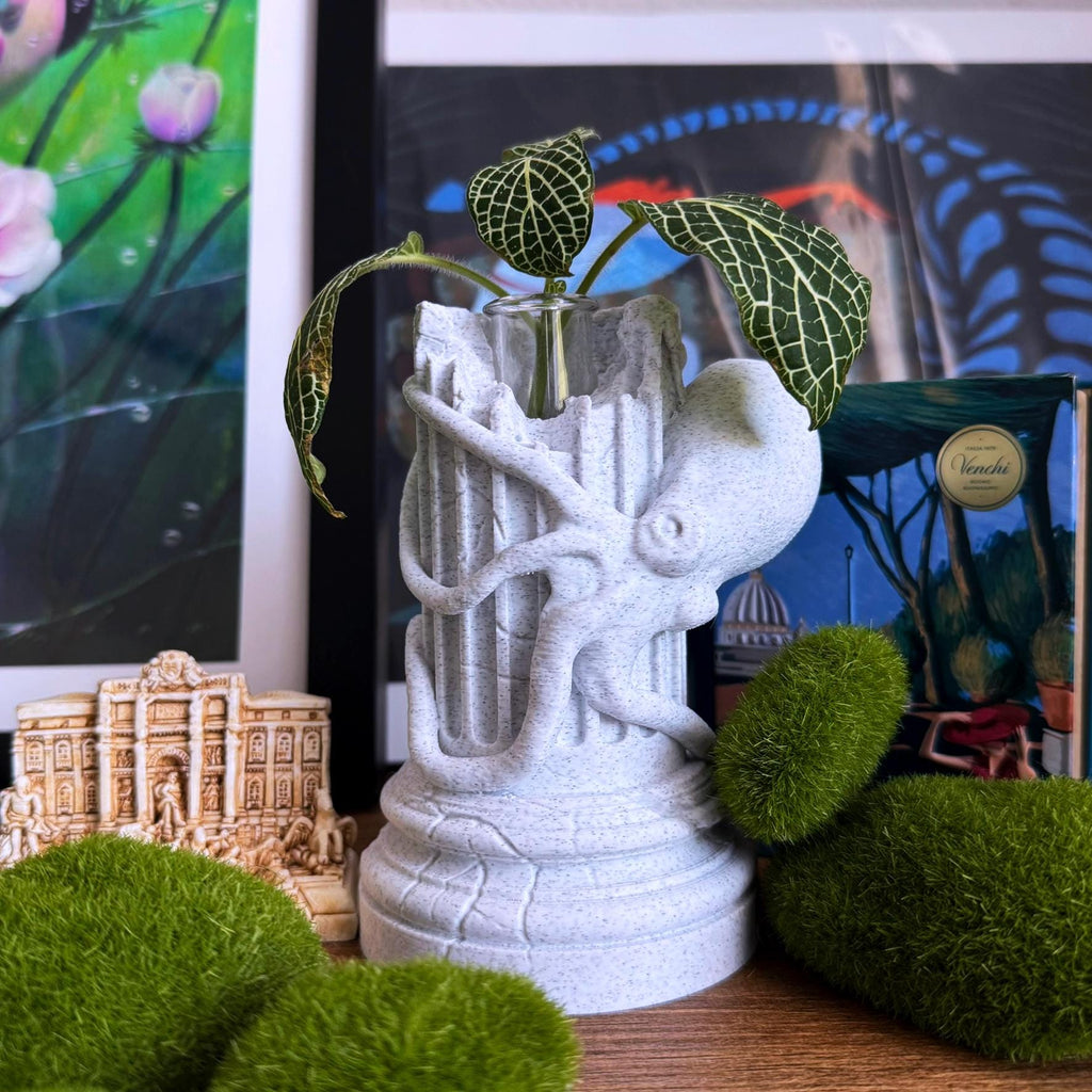A propagation vase designed to look like a Greek Column with an Octopus wrapped around it