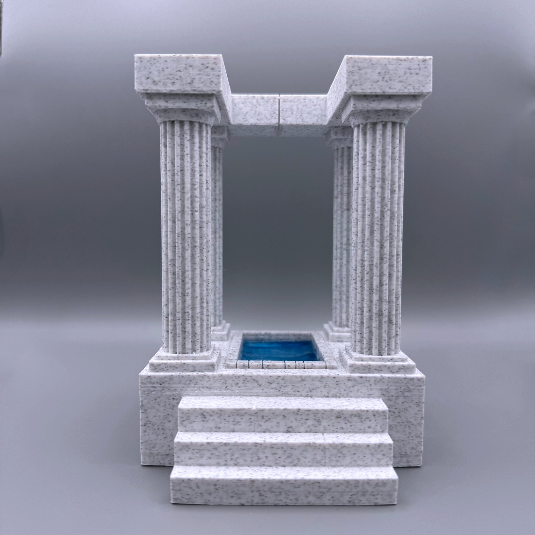 These 3d printed marble bookends are in the form of an ancient temple, with a pool at the center. These stately bookends elevate any bookshelf and add a classical flair. For lovers of antient architecture of Grece and Rome